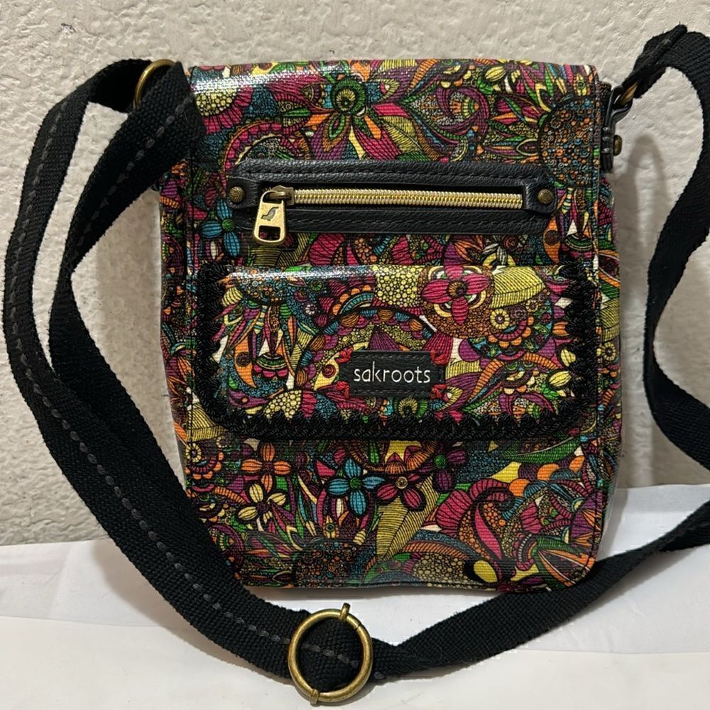 Sakroots Multi colored colorful polyvinyl floral crossbody purse.